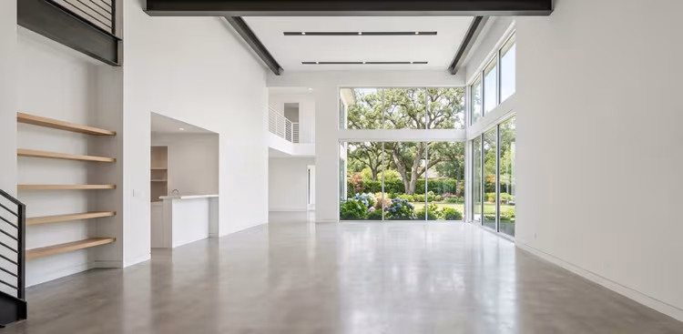 Empty concrete loft before AI design